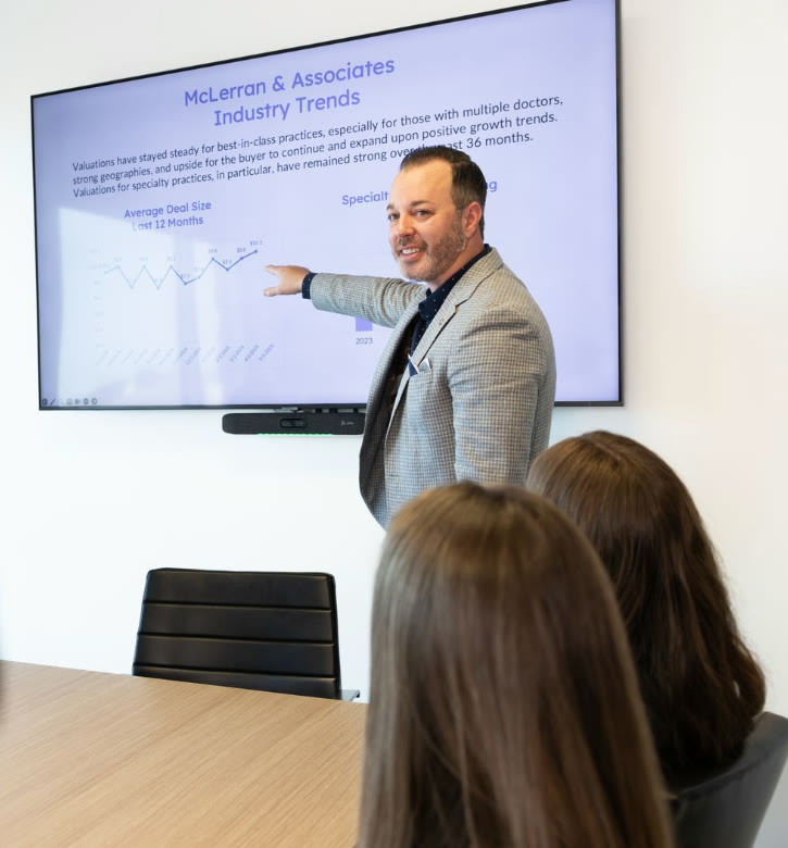 A McLerran & Associates advisor presenting industry trends to practice owners.